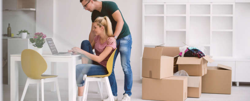 young couple moving into new home
