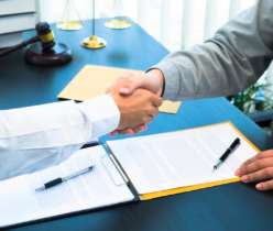 client shaking hands with conveyancer